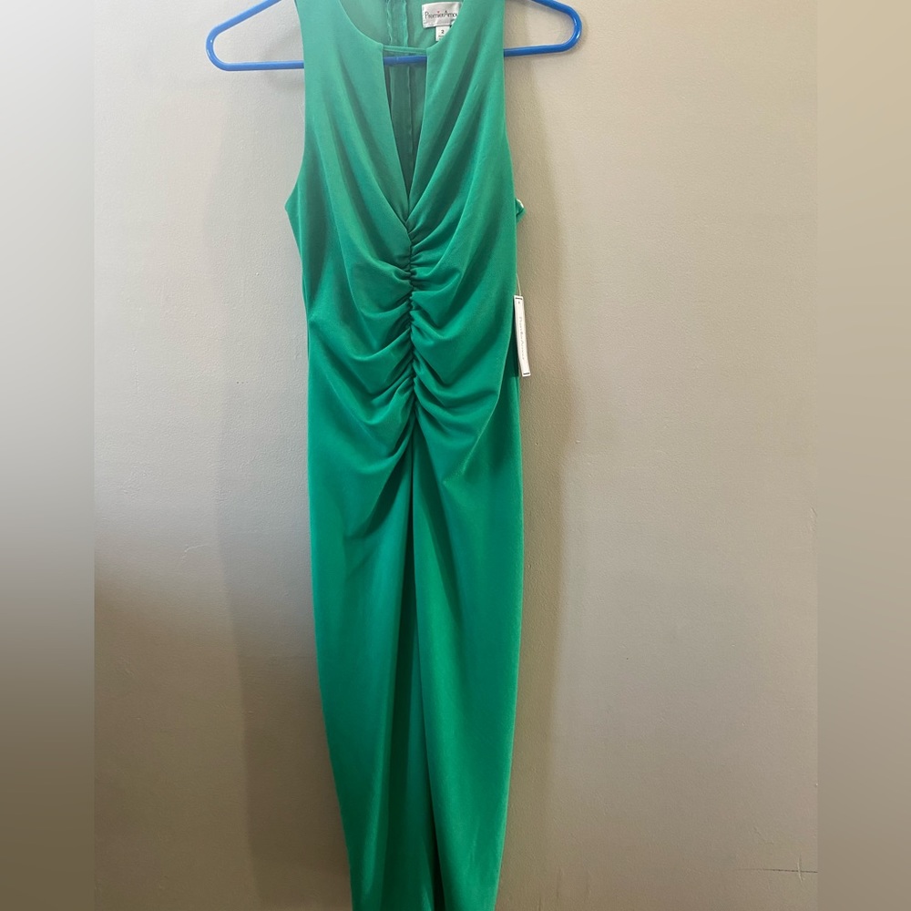 Green dress size 2P with zipper in the back cut out V shape in the front midi